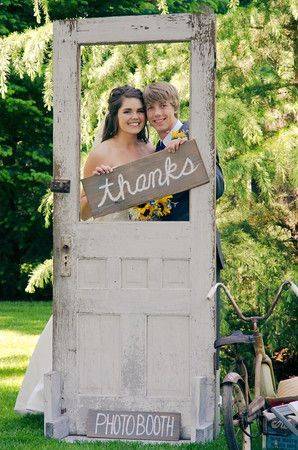 Photogenic Wedding Door, Holding Thanks Sign Through Empty Window // 10 Rustic Old Door Wedding Decor Ideas For Outdoor Country Weddings