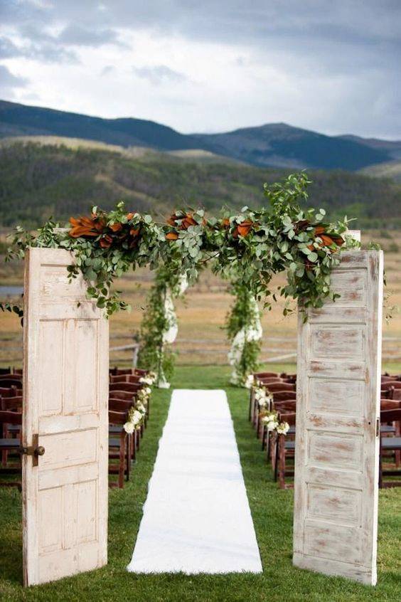 Mountain Wedding With White Wooden Old Doors, And Beautiful Backdrop // 10 Rustic Old Door Wedding Decor Ideas For Outdoor Country Weddings
