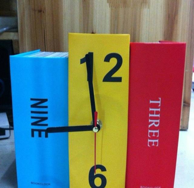 Cool & Creative Table Book Clock // 10 BOOK Furniture Design Pieces That Will Take Your Love Of Reading To New Heights