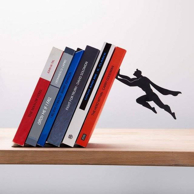 Superman Superhero Bookend // 10 BOOK Furniture Design Pieces That Will Transform Your Reading Forever